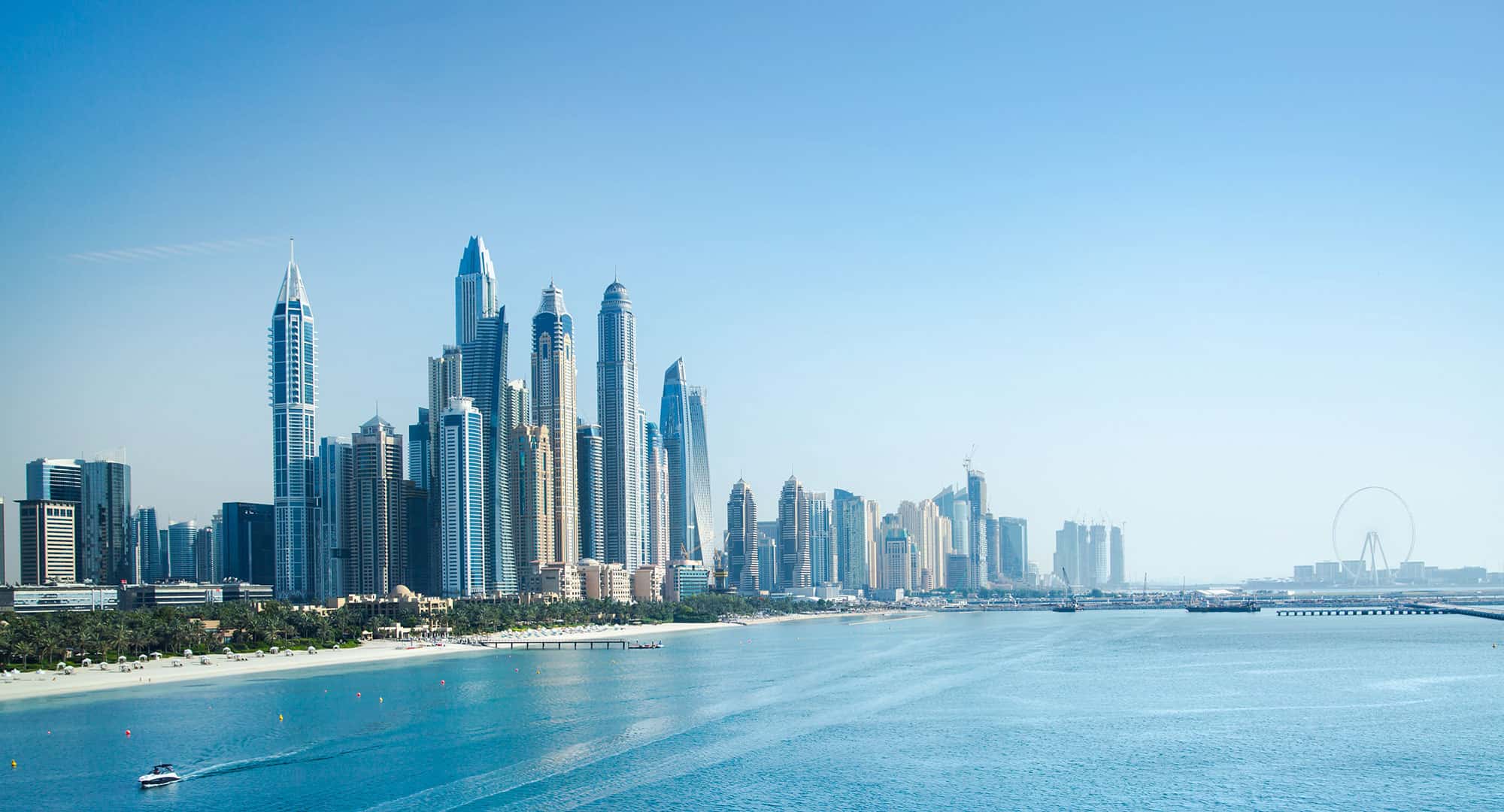 Modern Dubai skyline with skyscrapers and waterfront views in Dubai, UAE.