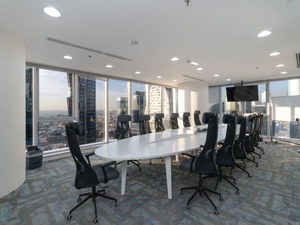 Modern coworking office space in Dubai with scenic city views and ergonomic seating.