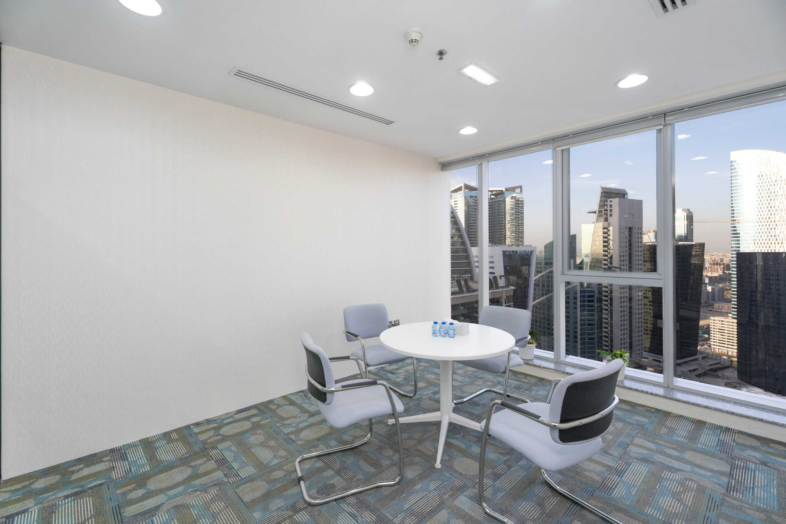 Modern coworking space with city views in Dubai, UAE.