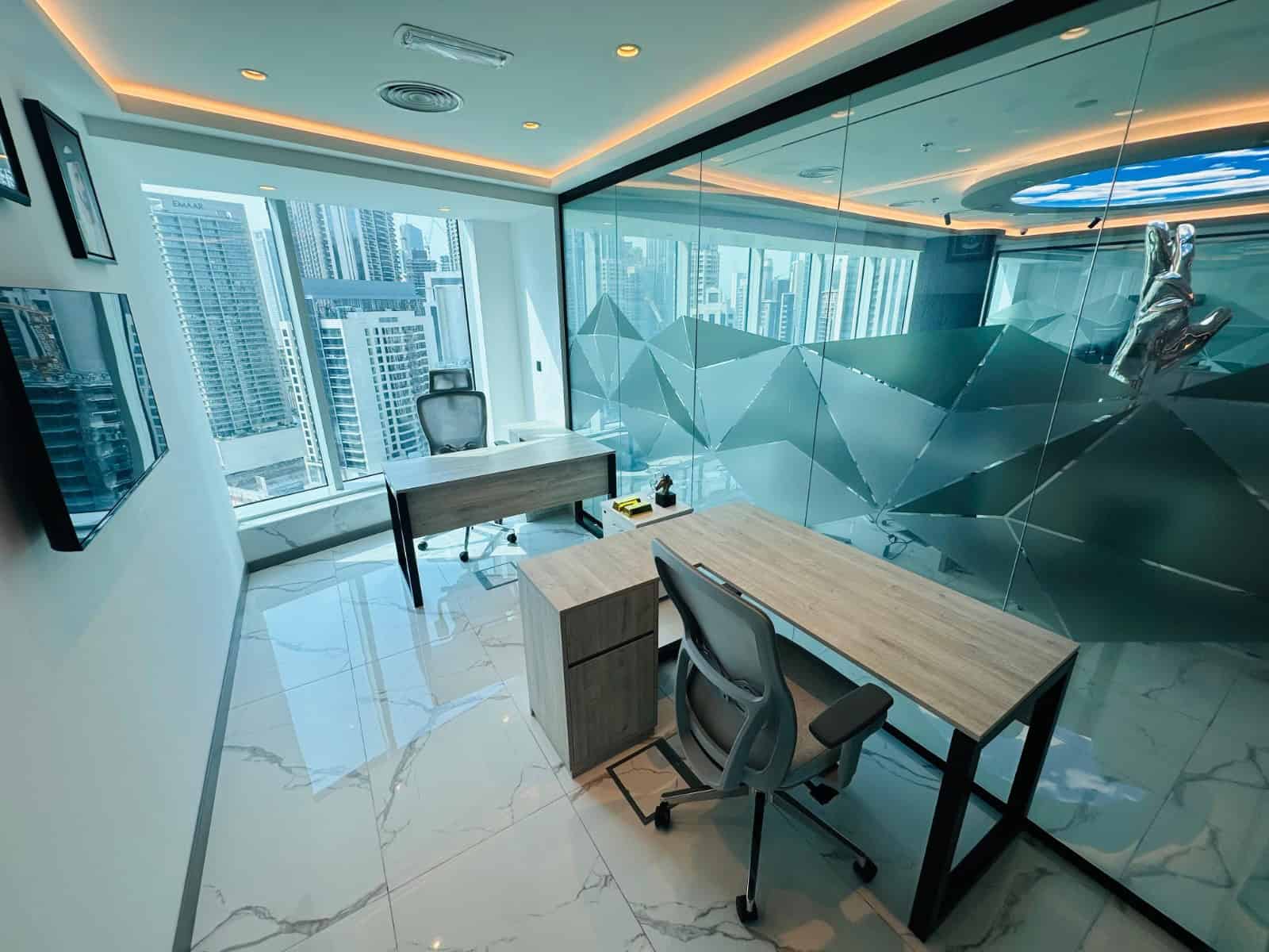 Bright Dubai office with panoramic city views, modern furnishings, and glass walls for productive work.