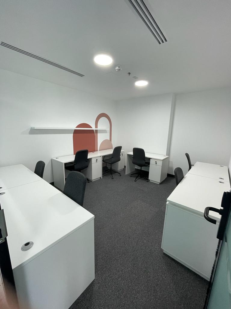 Refers to a contemporary workspace designed for collaboration in UAE.