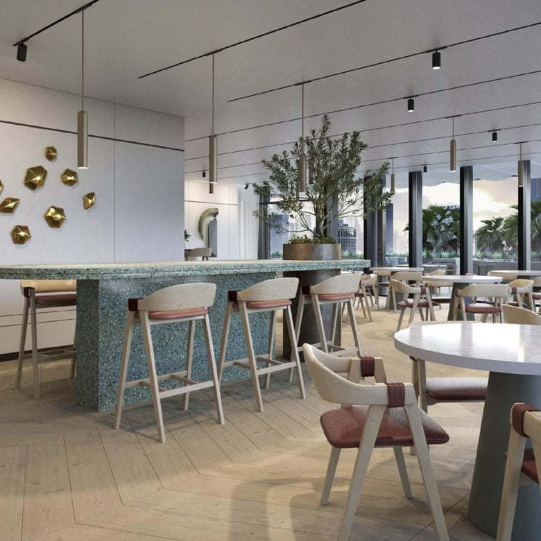 Luxurious coworking lounge in Dubai with contemporary decor and city views.