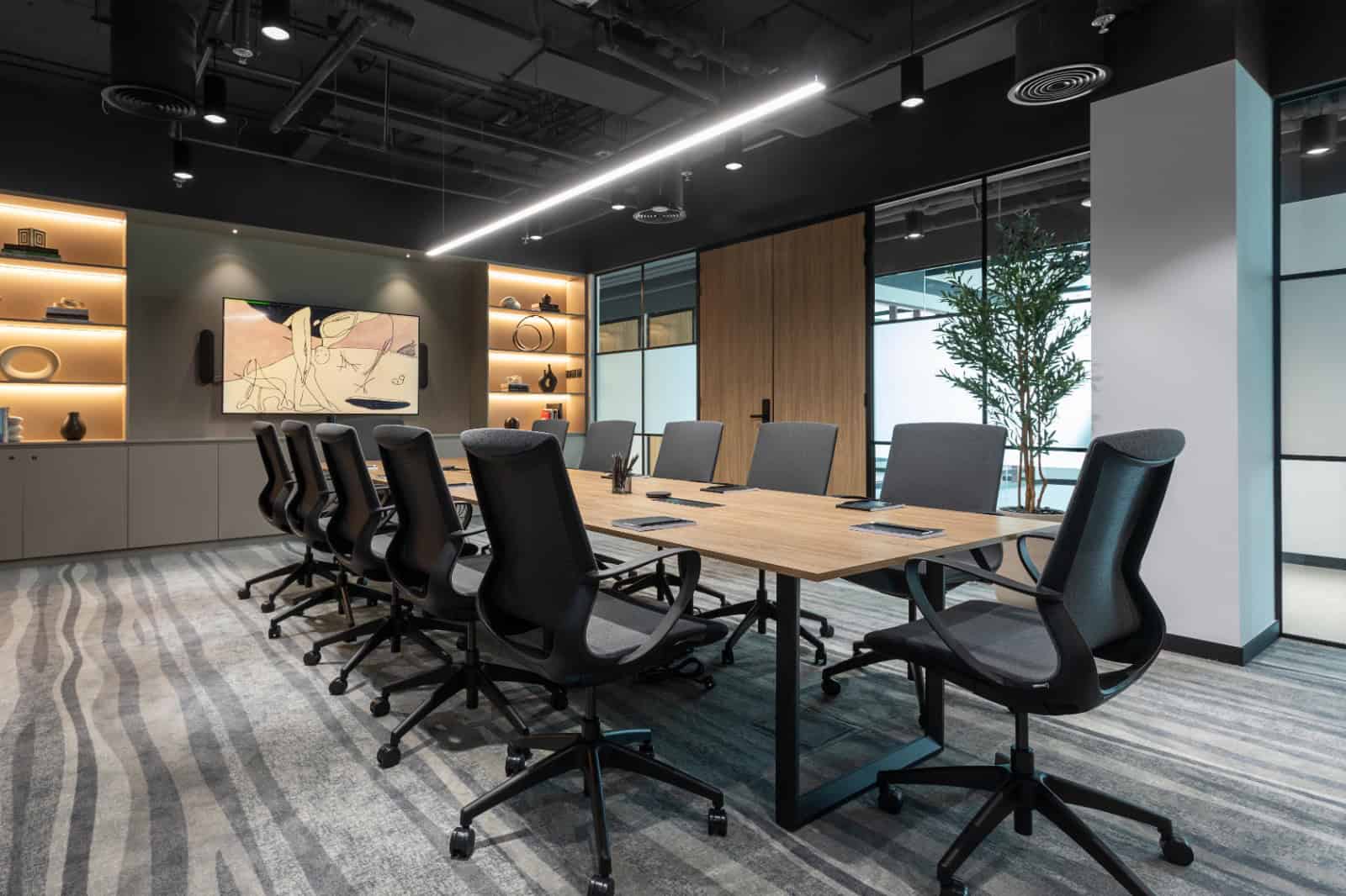 Bright, professional meeting room with sleek furniture and contemporary decor.