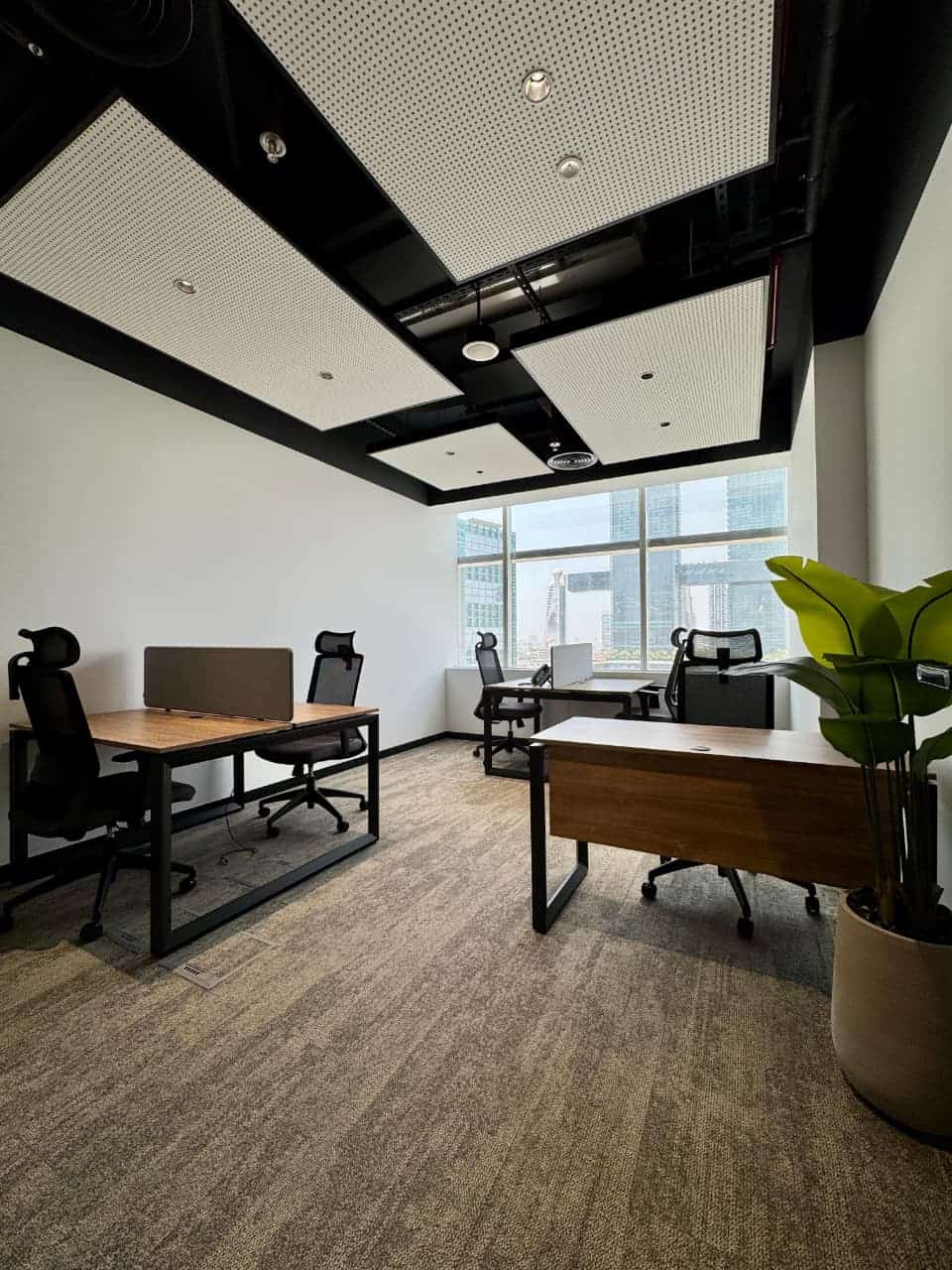 Comfortable office desks and ergonomic chairs at Nextspace in UAE.