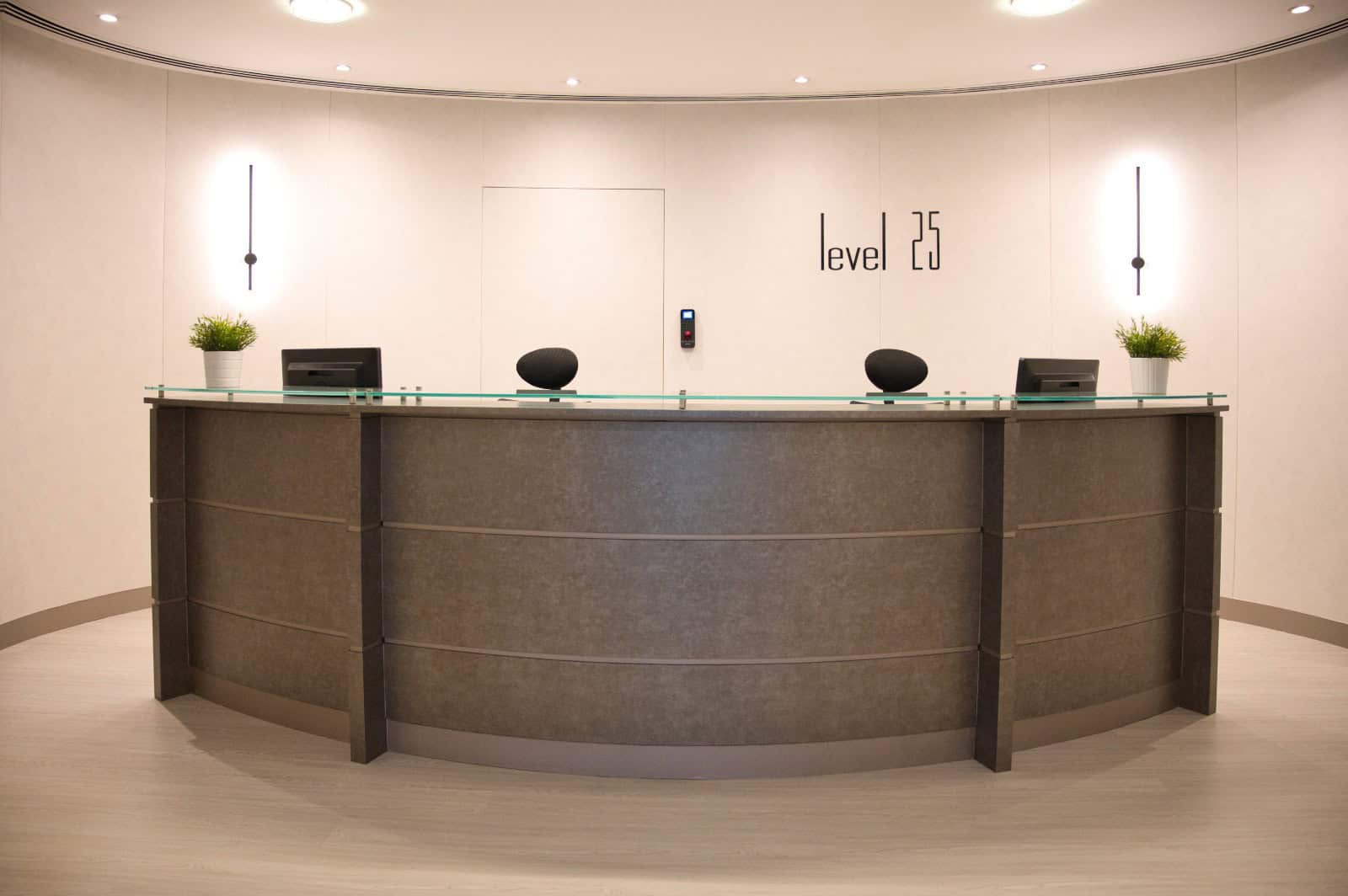 Spacious coworking reception area at Nextspace UAE, featuring sleek design, modern decor, and a professional atmosphere.