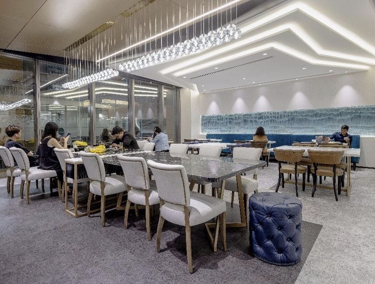 Elegant interior of Nextspace UAE coworking lounge with contemporary decor and bright ambiance.