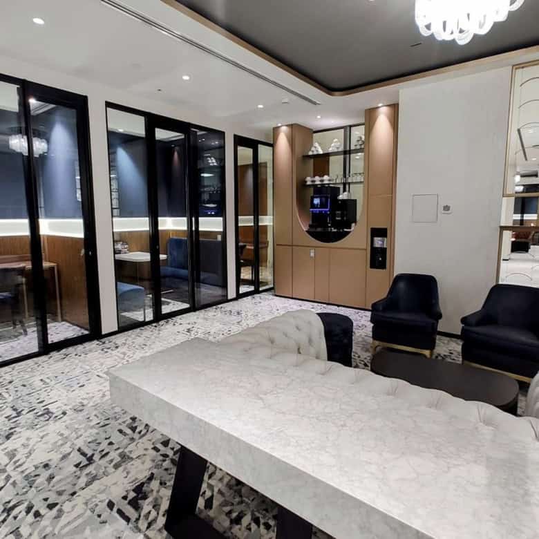 Stylish and functional workspace with private meeting pods and lounge area in Dubai, UAE.