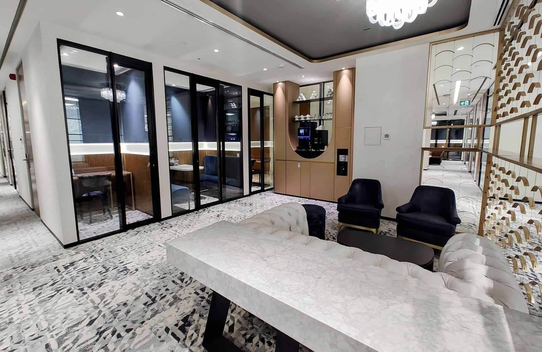 Stylish and functional workspace with private meeting pods and lounge area in Dubai, UAE.