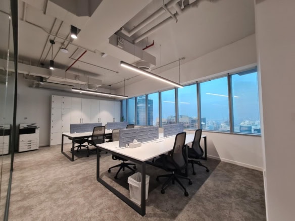 Bright office with ergonomic chairs and desks in Nextspace UAE coworking space.