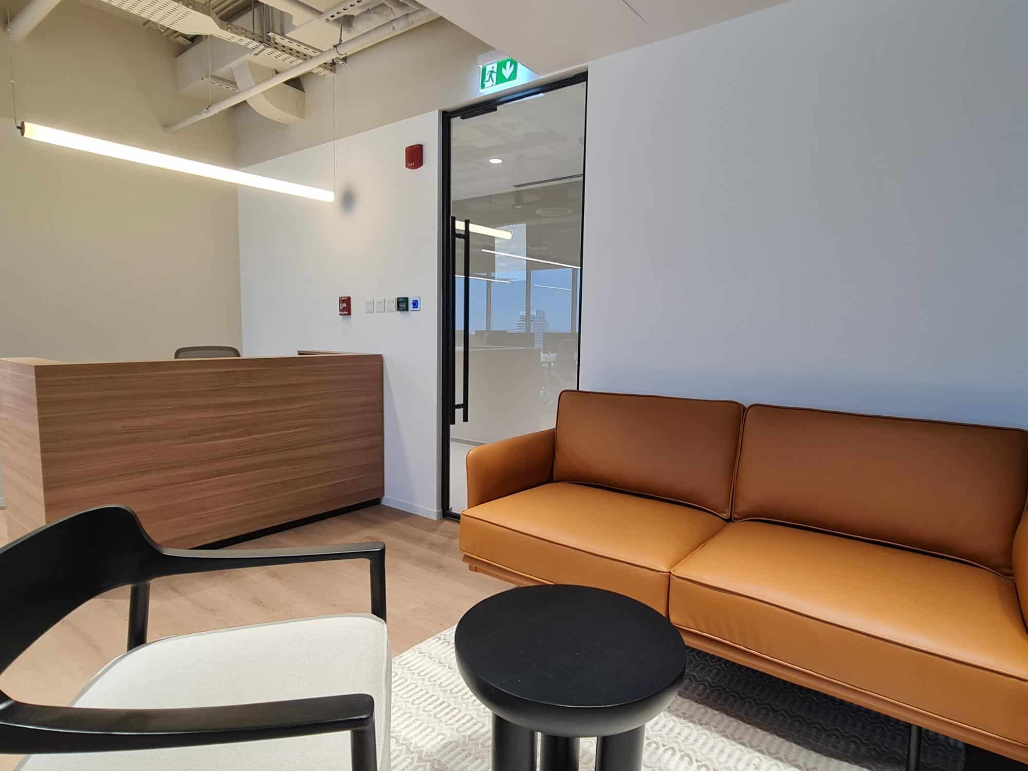 Comfortable coworking lounge at Nextspace UAE with modern furniture and inviting atmosphere.