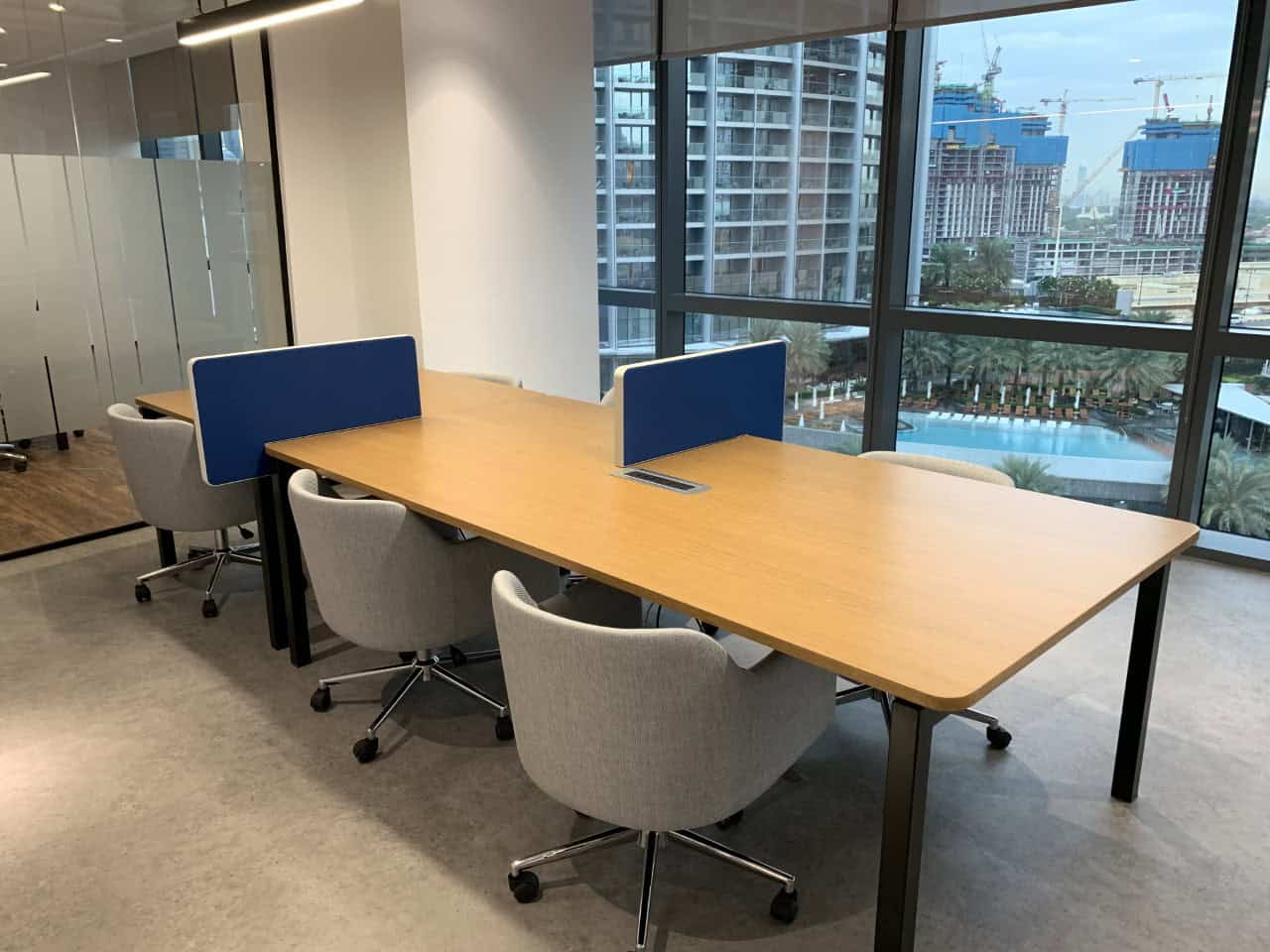 Luxury workspace, professional environment, city view, collaborative office setting, flexible workspace, Dubai office.