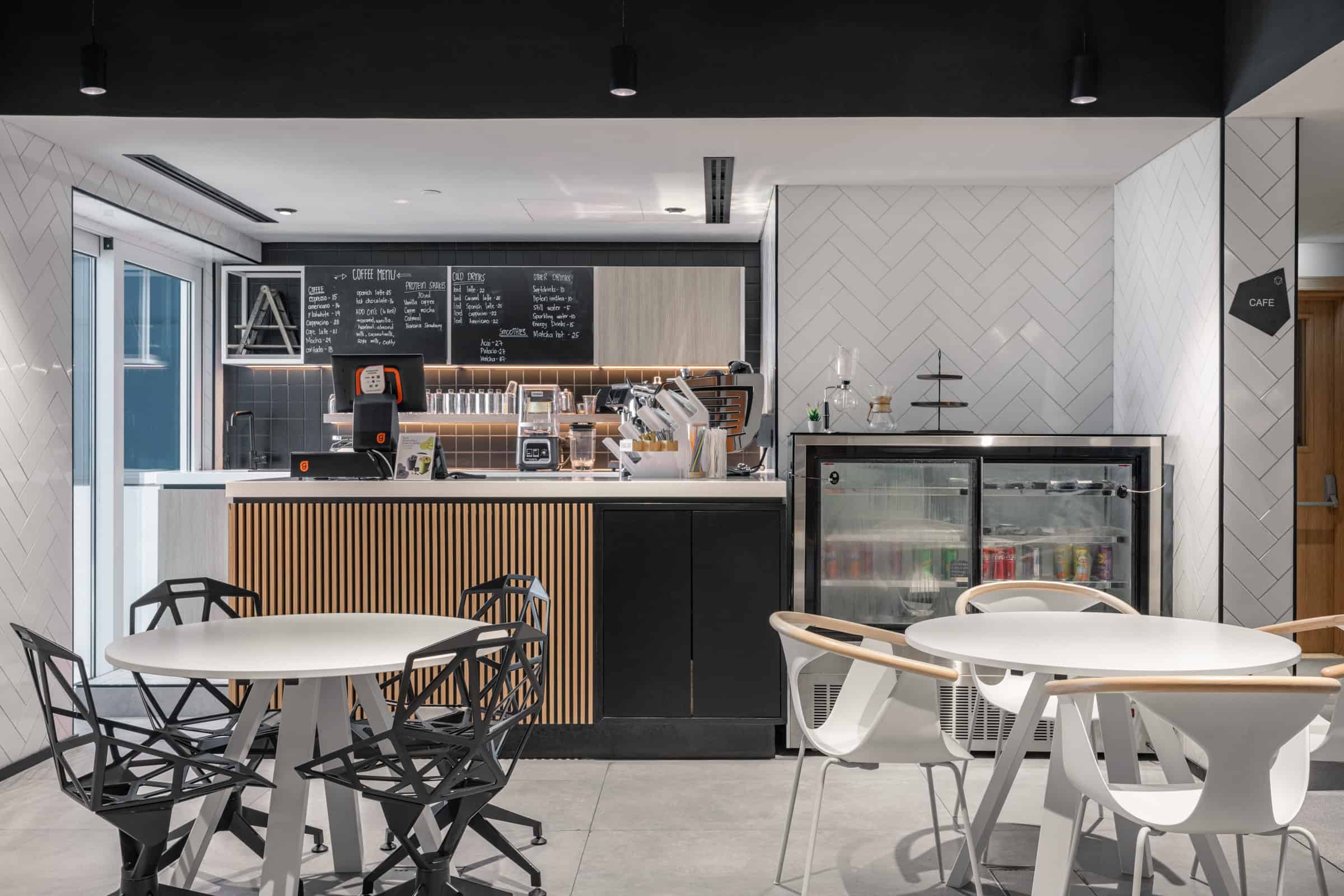 Stylish coworking space with café amenities, perfect for productivity and networking in Dubai.