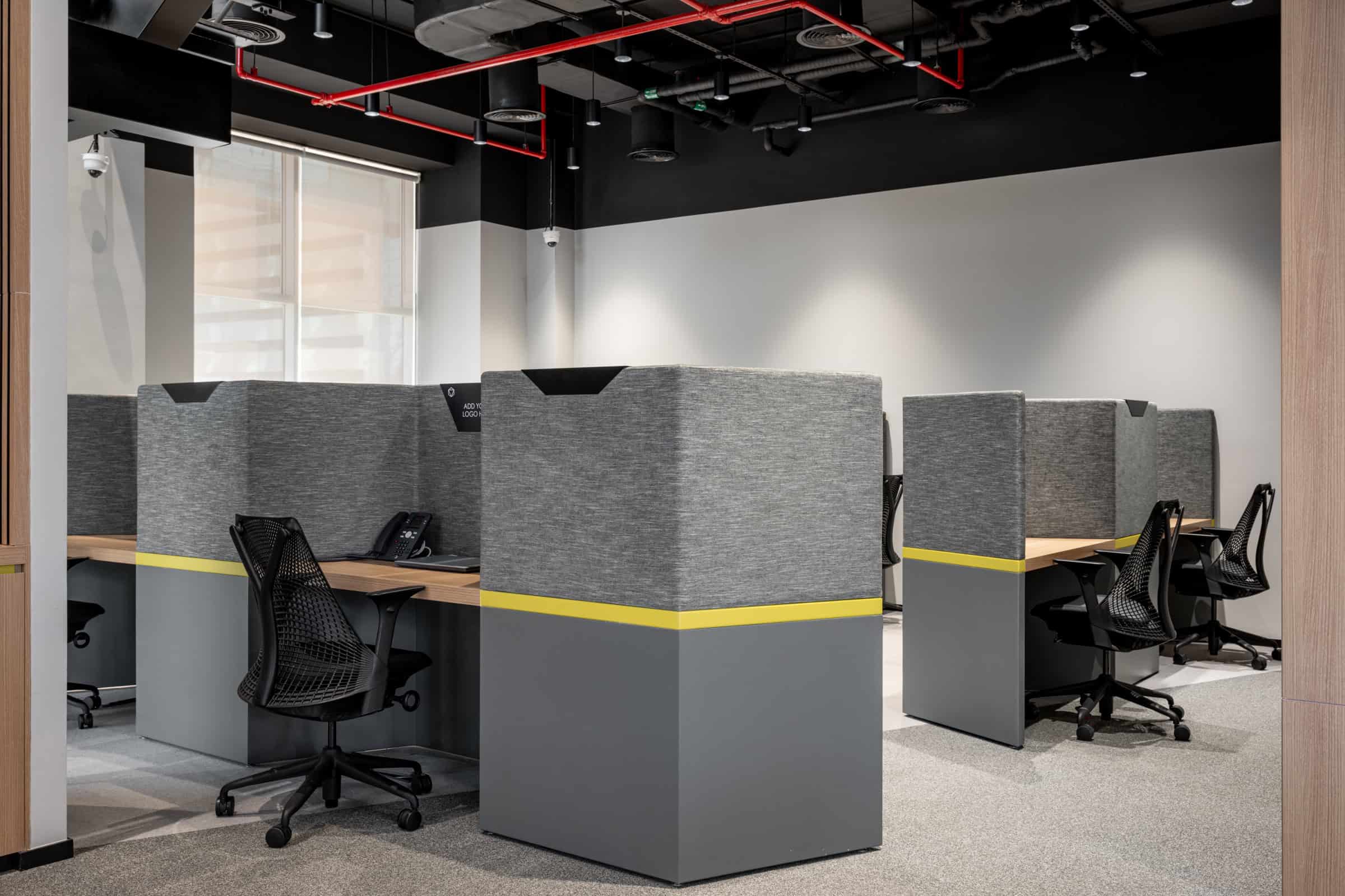 Flexible coworking workspaces in Dubai with soundproof booths, comfy chairs, and tech-ready environment at Nextspace UAE.