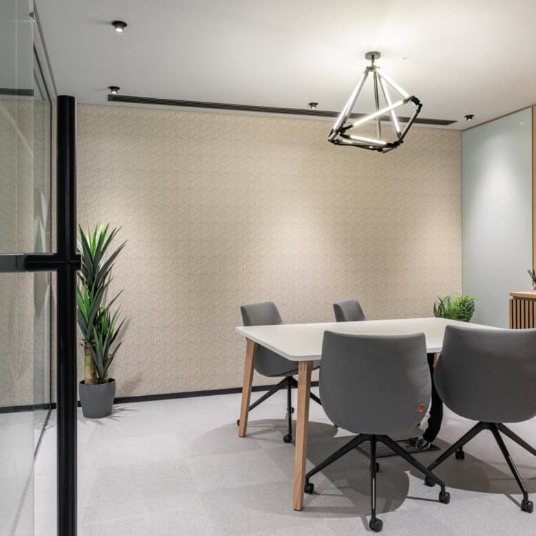 Contemporary Dubai coworking space with stylish decor and collaborative work environment.