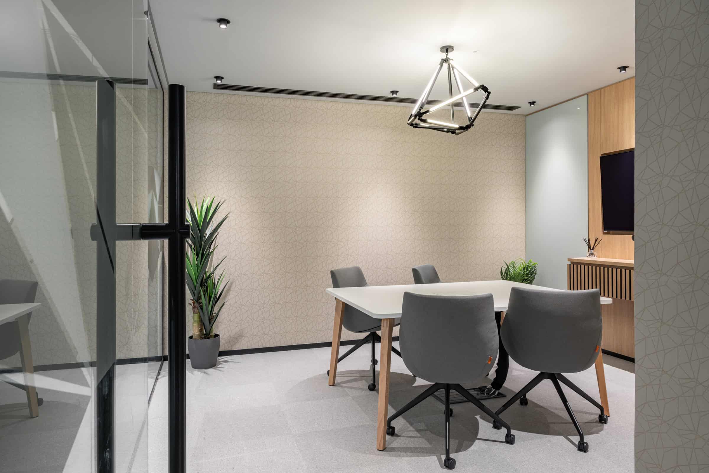 Contemporary Dubai coworking space with stylish decor and collaborative work environment.