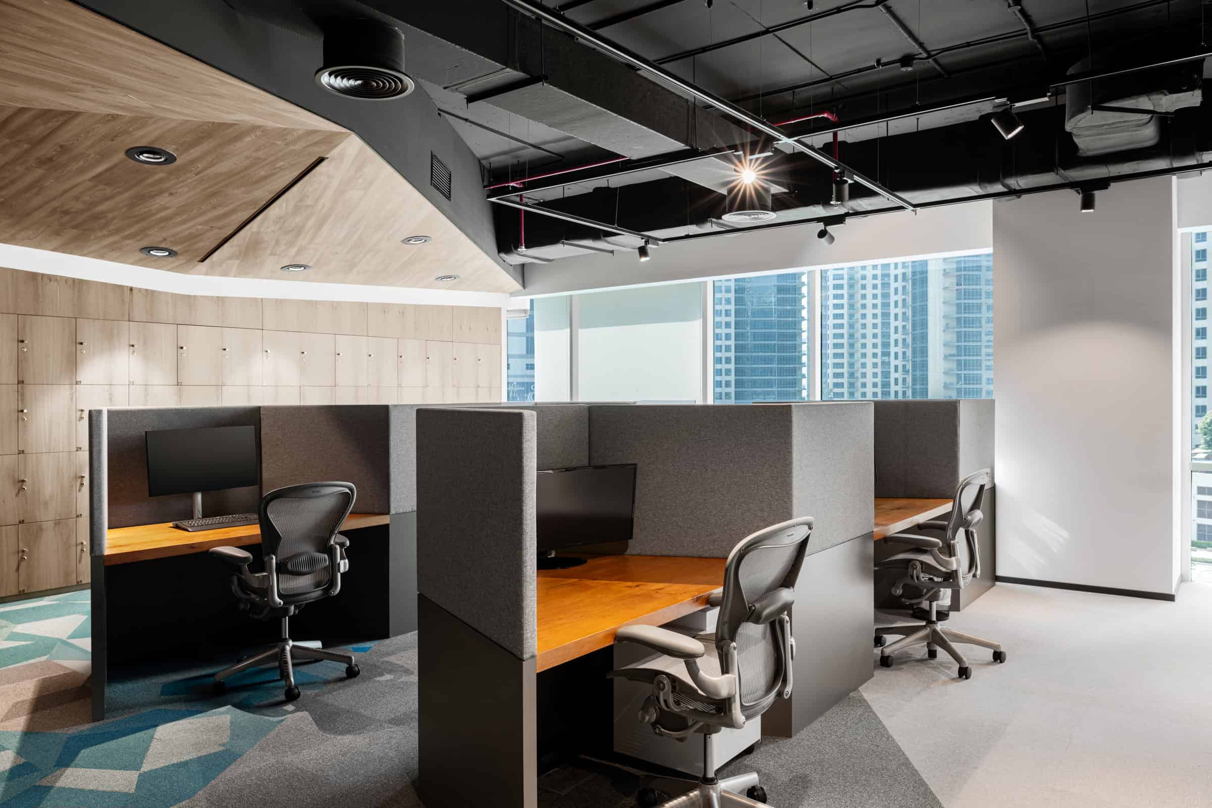 Modern coworking space in Dubai. Bright office with workstations and city views for entrepreneurs.