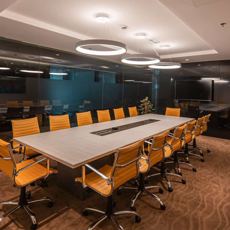 Spacious modern conference room with ergonomic chairs and advanced AV equipment in Dubai.