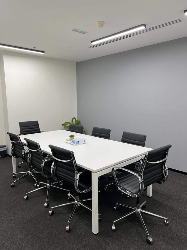 Contemporary meeting room at Nextspace UAE with professional office chairs and minimalist design.