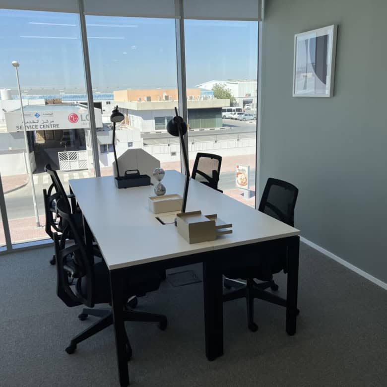 Bright, professional office with large windows and stylish decor in Dubai.