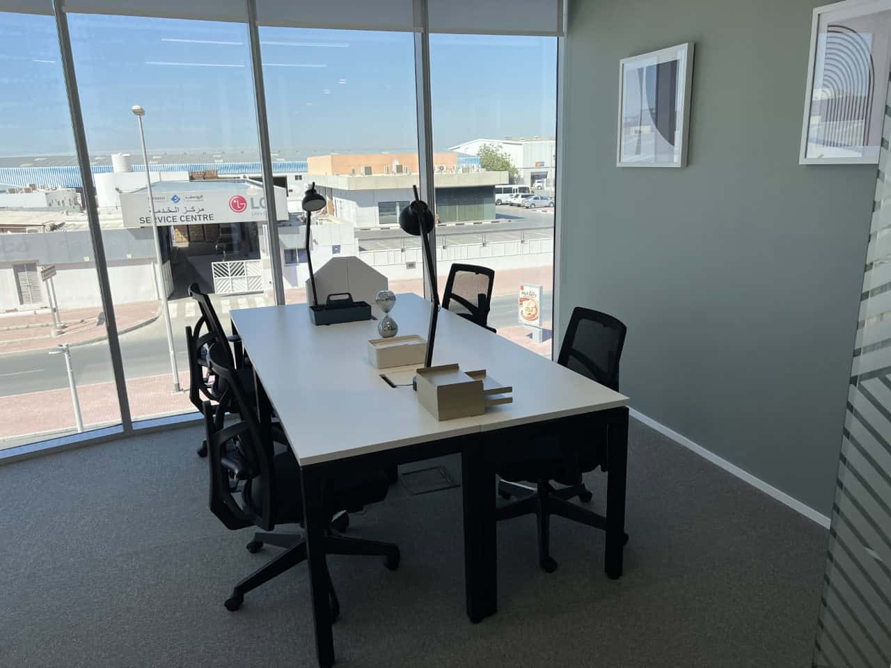 Bright, professional office with large windows and stylish decor in Dubai.