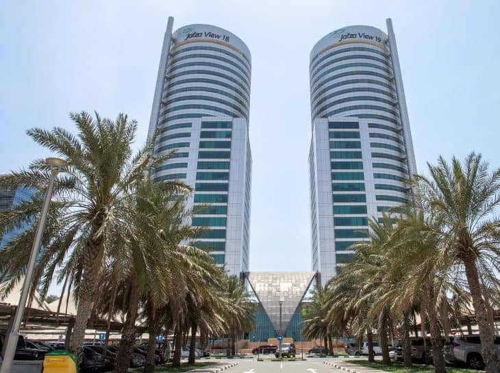 Sleek office buildings in Dubai featuring Nextspace coworking spaces, Perfect for business in UAE.