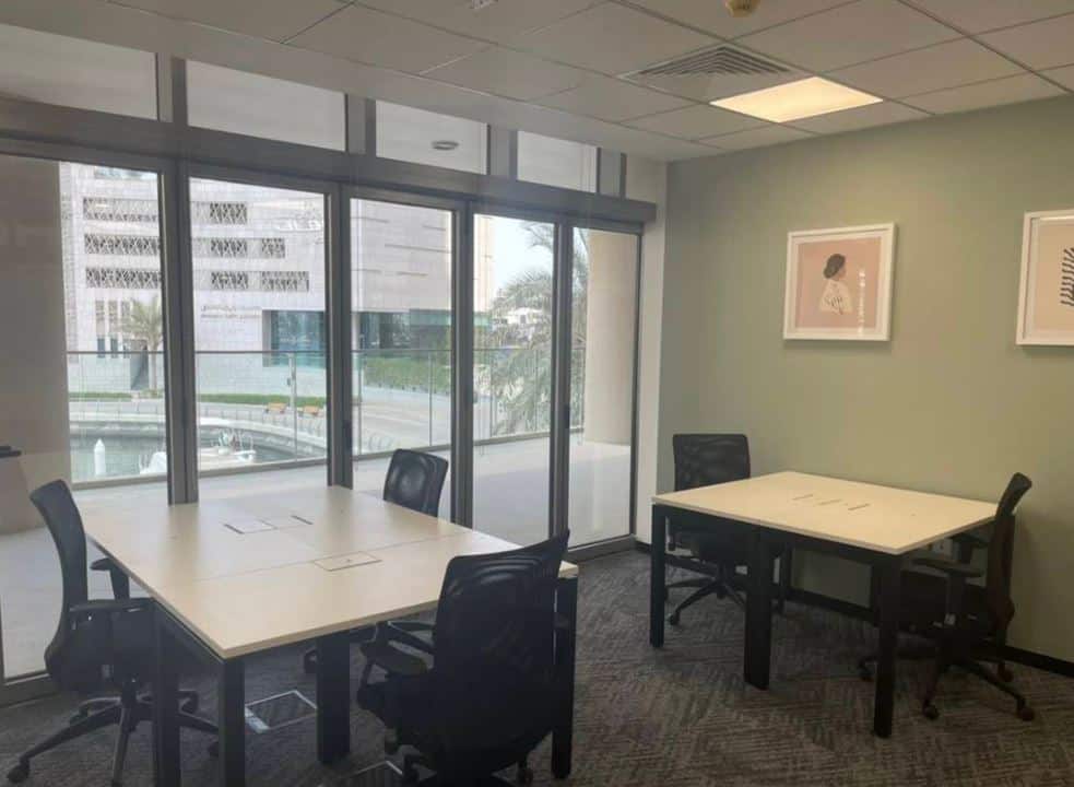 Modern office space with large windows and collaborative areas in Dubai UAE.