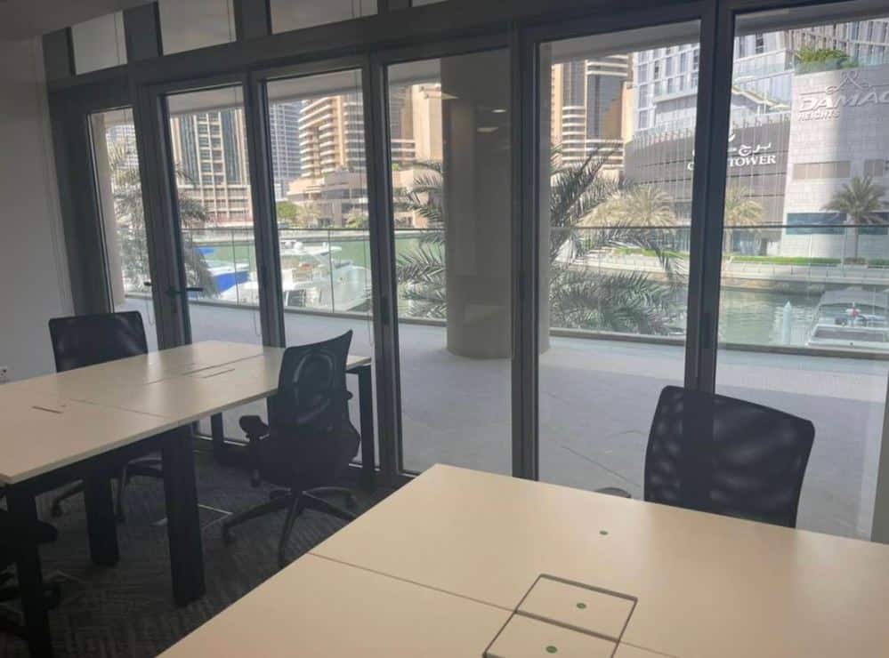 Modern coworking space in Dubai with private offices and meeting rooms.