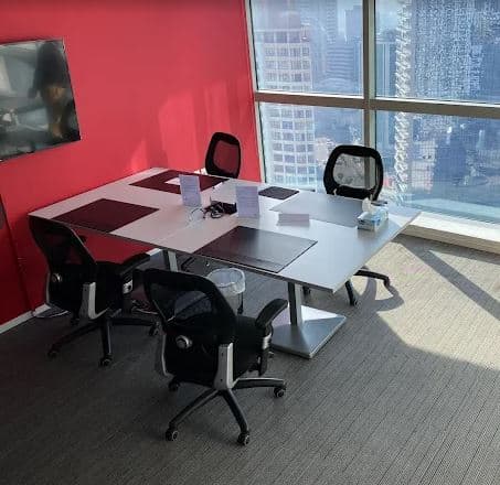 Modern coworking space with meeting rooms in Dubai, UAE.