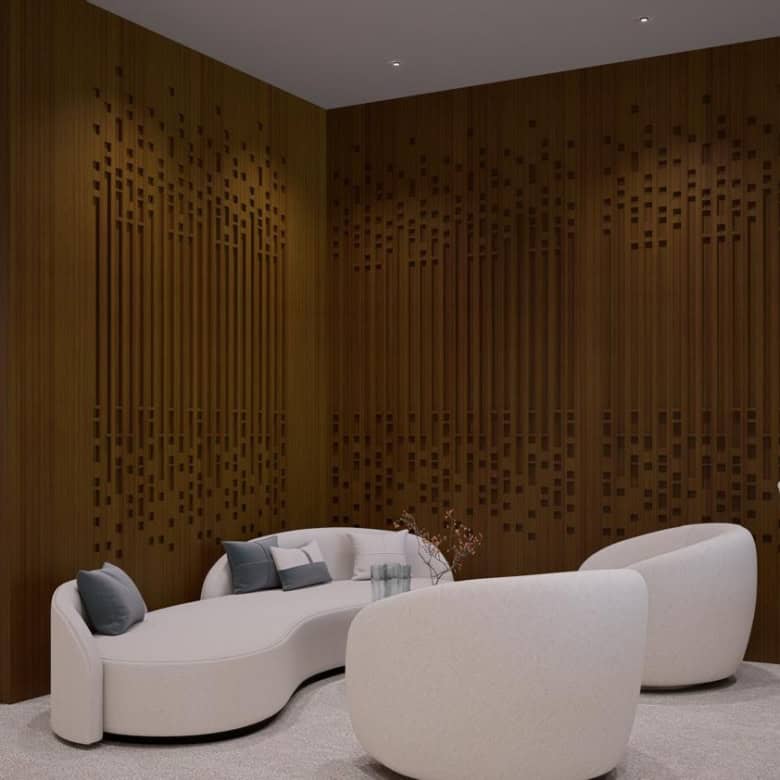 ALT text: Elegant UAE coworking lounge with modern seating and contemporary wooden wall design.