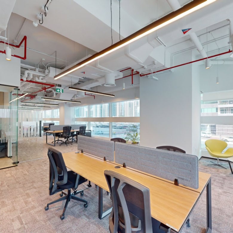 Bright, contemporary office at Nextspace UAE featuring stylish furniture, natural light, and collaborative workspaces.