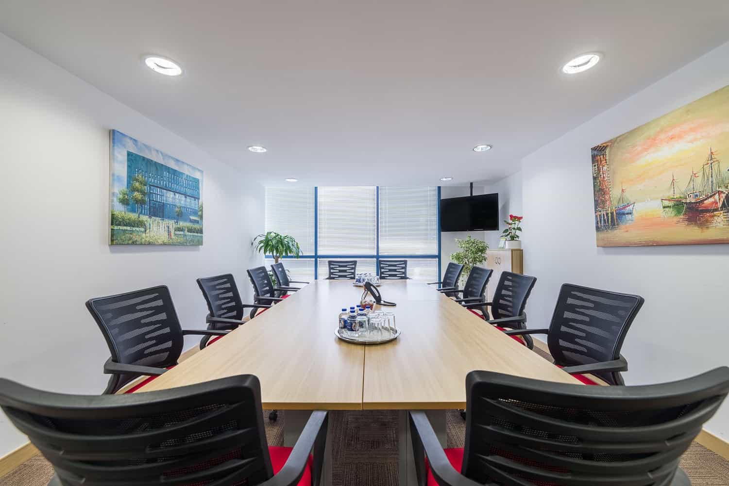 Modern conference room with meeting table and comfortable chairs in Dubai.