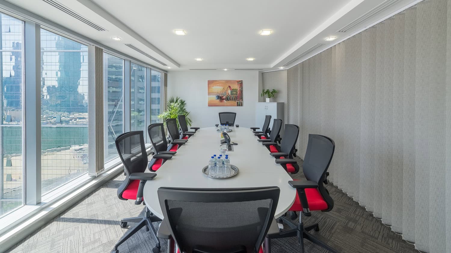 Spacious, high-tech conference room with city views in Dubai, ideal for corporate meetings and events.