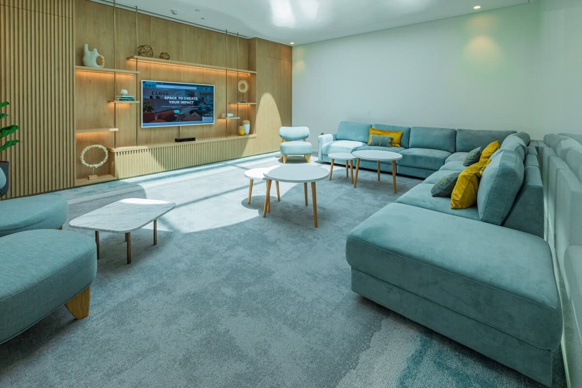Modern coworking space lounge in Dubai with stylish seating and contemporary design.