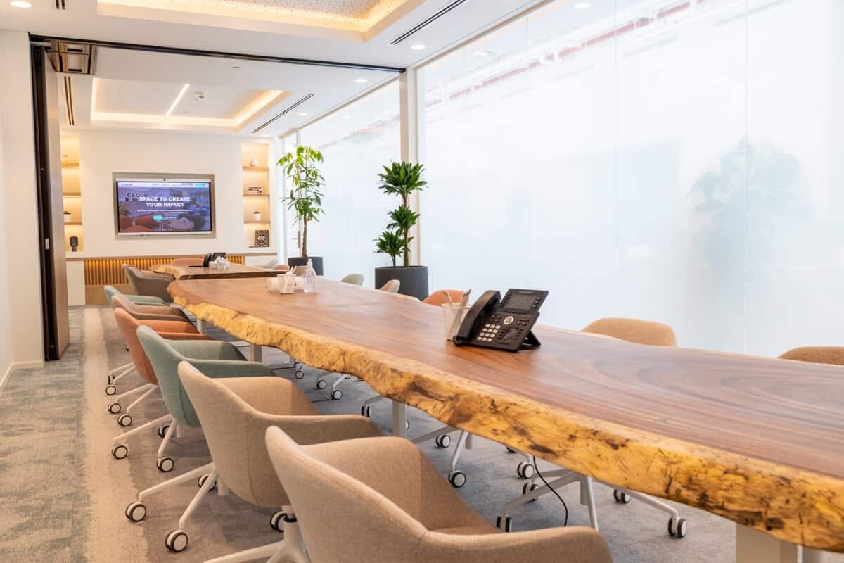 Modern coworking space in Dubai with vibrant work areas and meeting rooms.