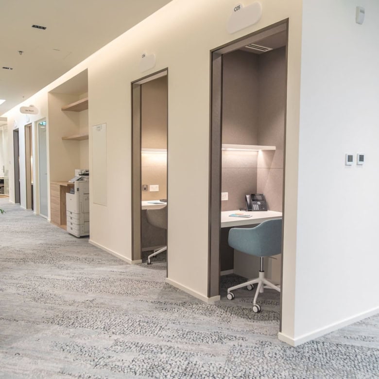 Versatile workspace with private pods and modern office equipment at Nextspace UAE for professionals.