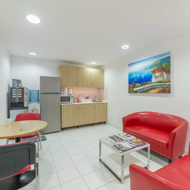 Cozy coworking space in Dubai with modern lounge and amenities.