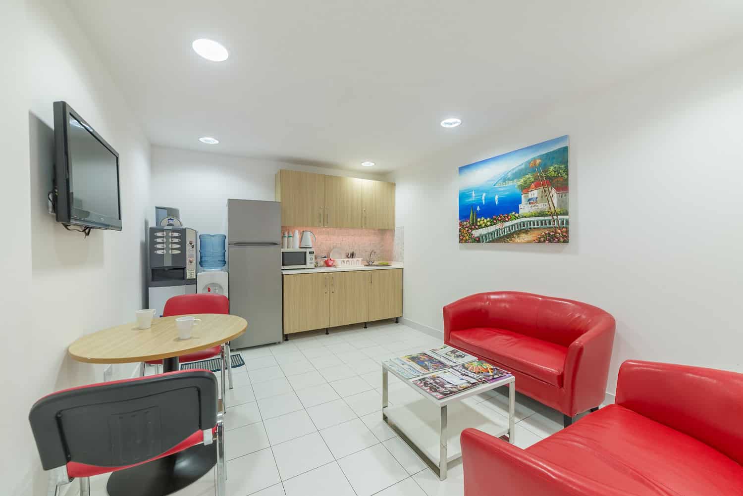 Cozy coworking space in Dubai with modern lounge and amenities.