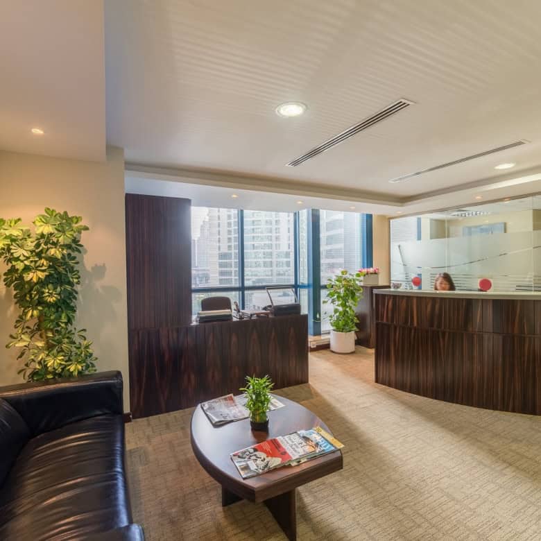 Bright office reception area with contemporary decor in Dubai UAE.