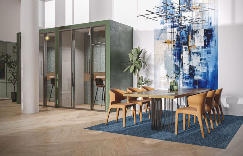 Modern coworking space with private pods and collaborative area in Dubai.