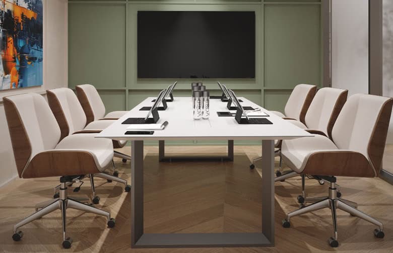 Stylish conference room with ergonomic chairs and digital devices, ideal for business meetings.