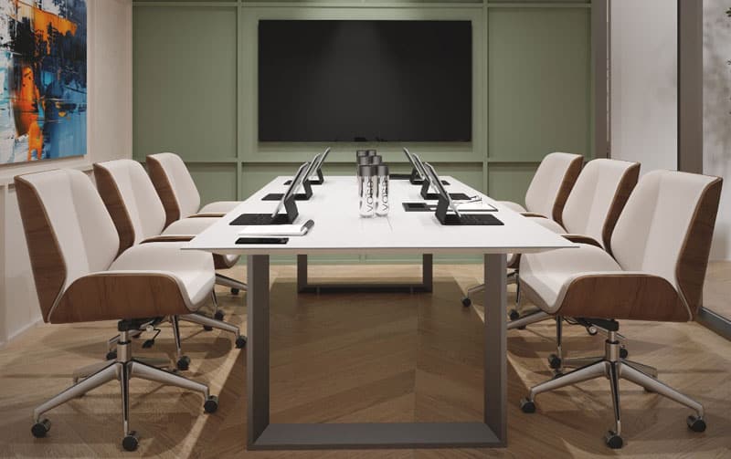 Modern coworking space in UAE meeting room. Stylish conference room with ergonomic chairs and digital devices, ideal for business meetings.