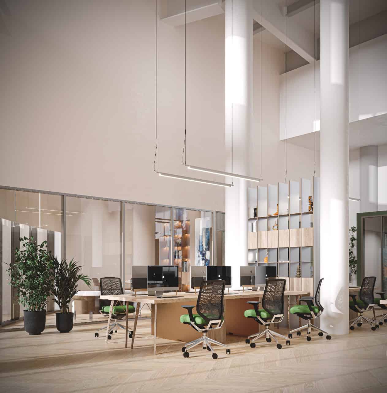 Modern coworking space with ergonomic chairs and desktop computers at Nextspace UAE. Bright and spacious office environment ideal for remote work and collaboration.