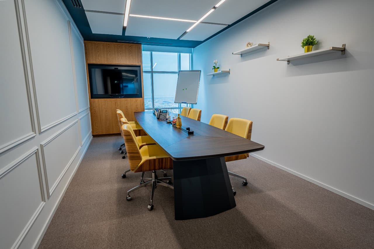 Bright conference room at Nextspace UAE offering flexible workspace solutions.