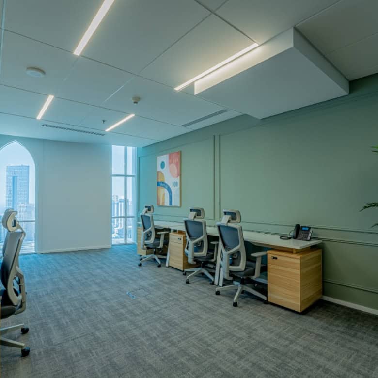 Modern coworking office space in Dubai with city views and ergonomic furniture.