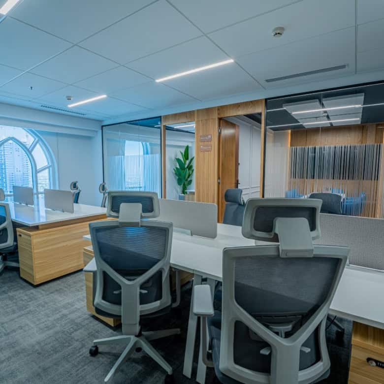 Contemporary shared office with ergonomic chairs and meeting rooms at Nextspace UAE.
