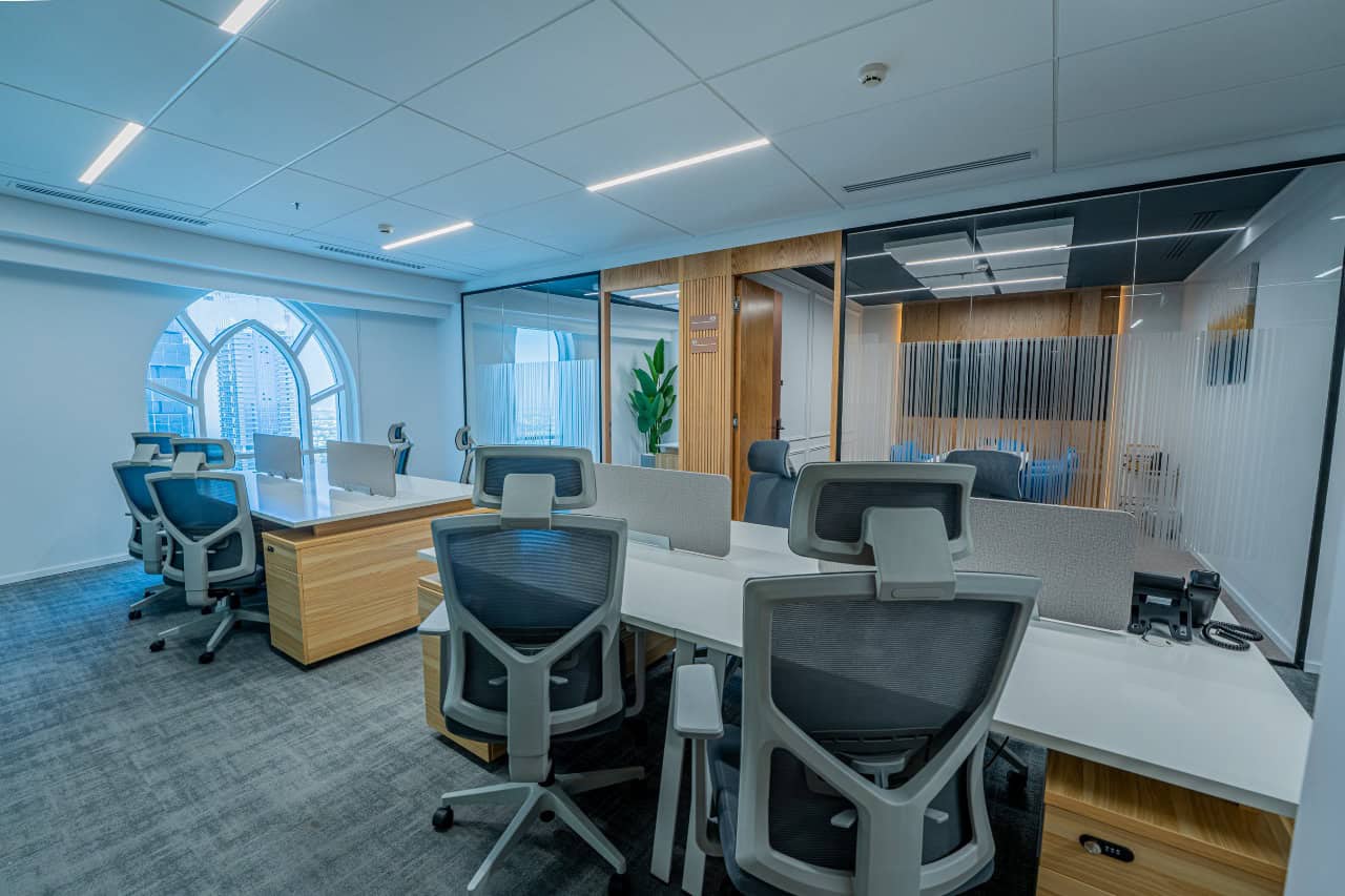 Contemporary shared office with ergonomic chairs and meeting rooms at Nextspace UAE.