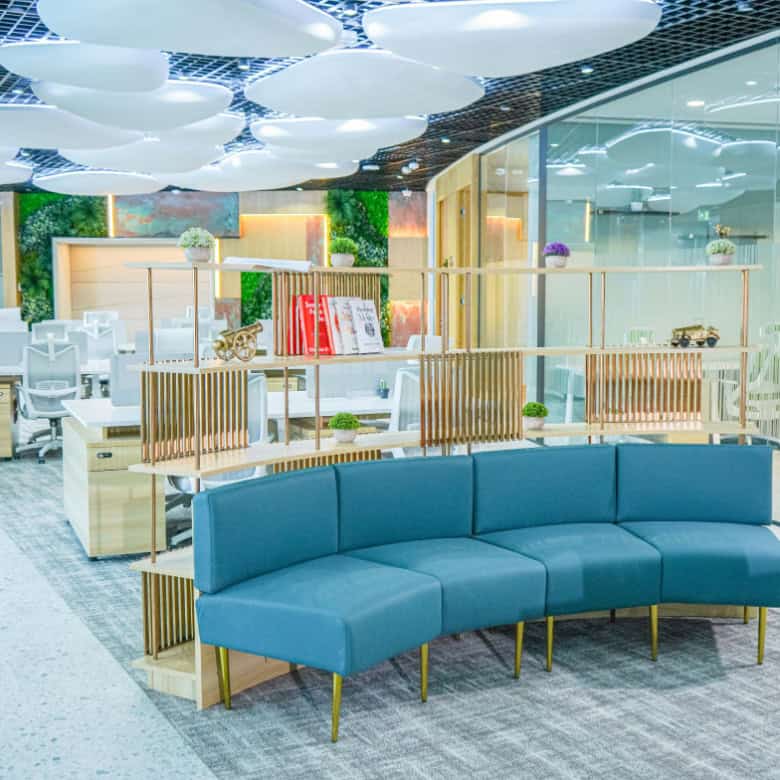 Bright, contemporary UAE coworking office featuring lounge seating and open workspaces.