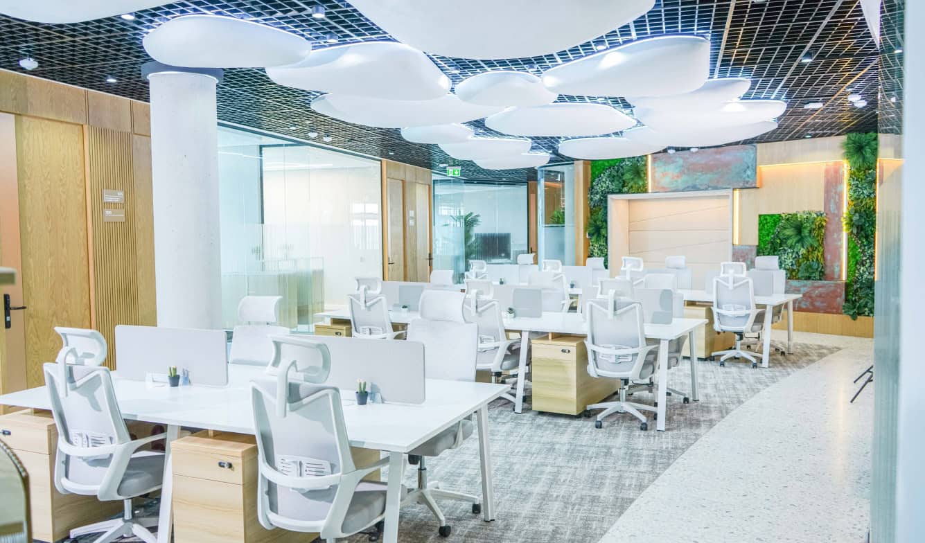 Bright, stylish office environment with ergonomic chairs and natural decor in Dubai coworking office.