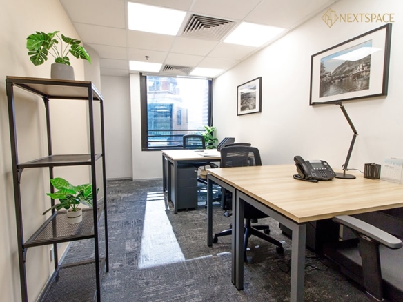 UAE coworking space with meeting room, modern office furniture, and professional environment.